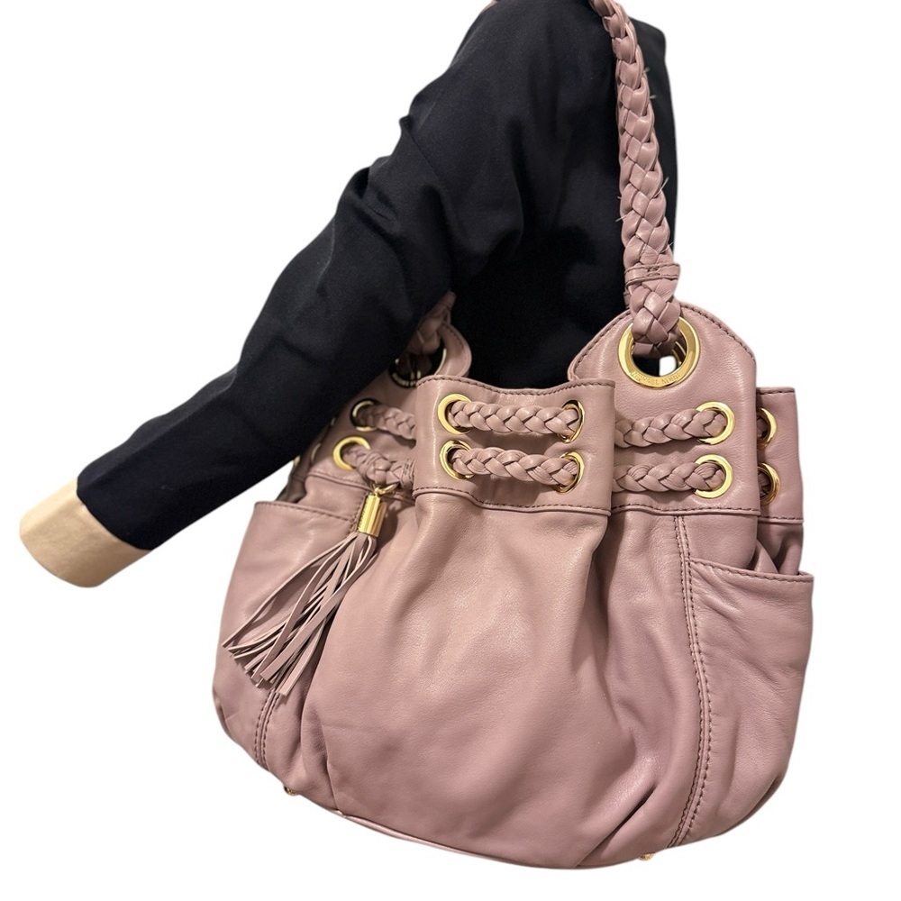 Michael Kors light purple Leather Tassel Bag in great conditions